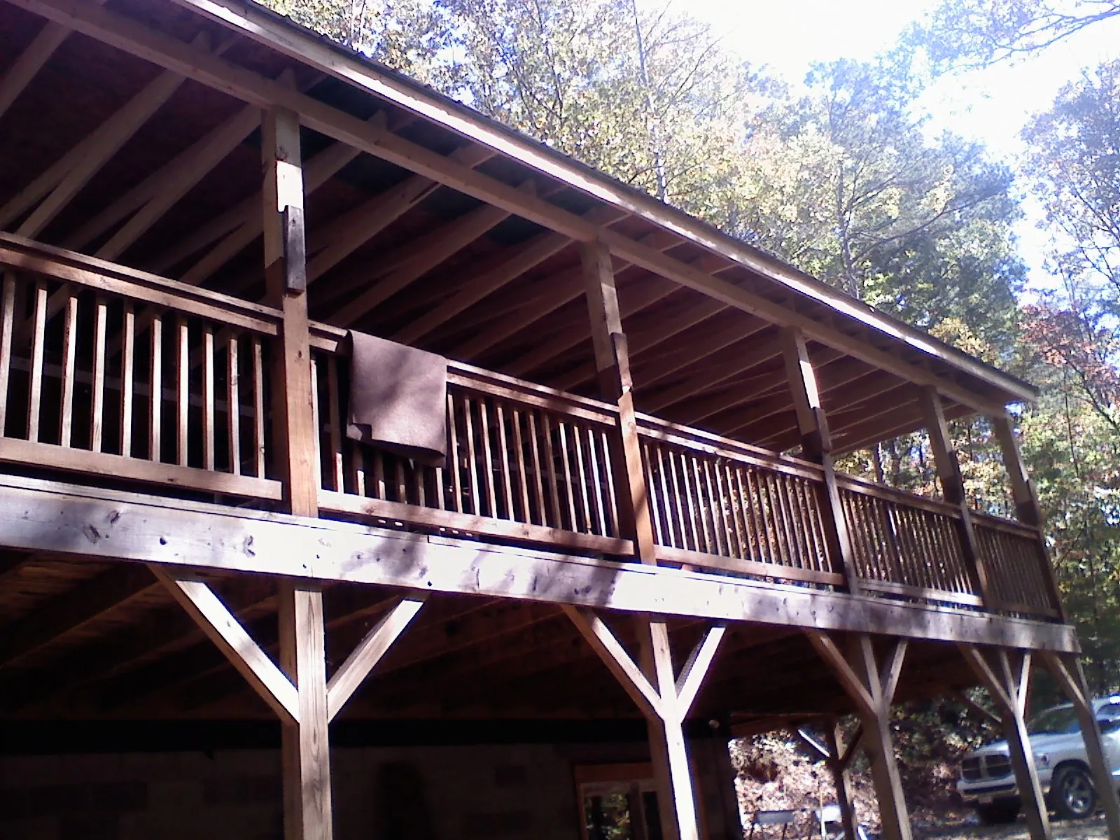 Timber framing under a new elevated porch and deck — Roof Leak Repair in Prospect Park by Roofing Brothers
